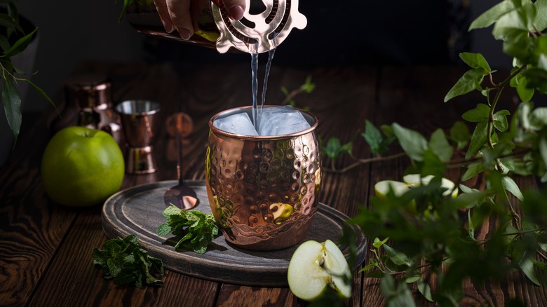 drink poured into a copper mug