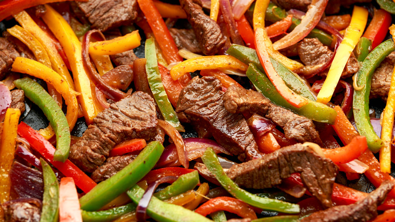 Cooked steak and bell peppers