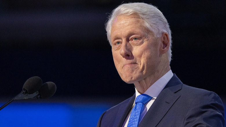Bill Clinton in front of microphone