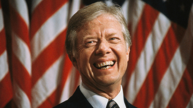 Jimmy Carter in front of American flag