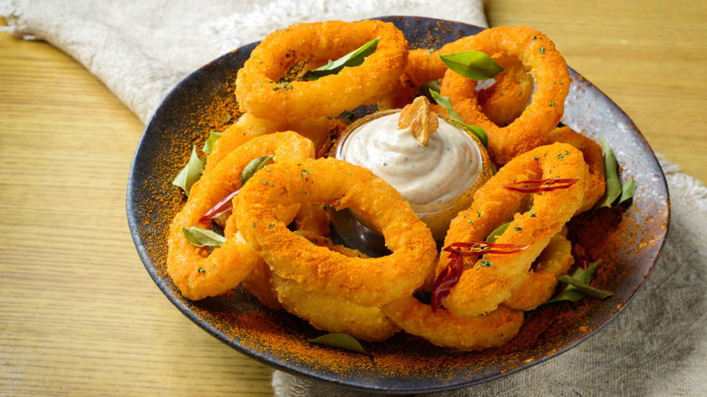 Plate of onion rings and dip