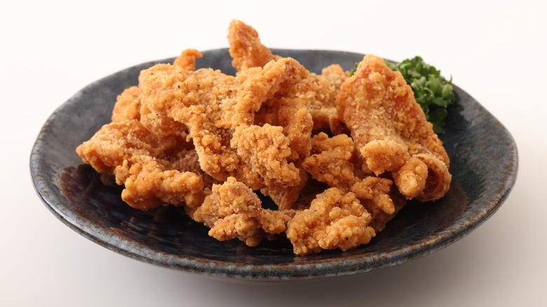 fried chicken skins on a plate