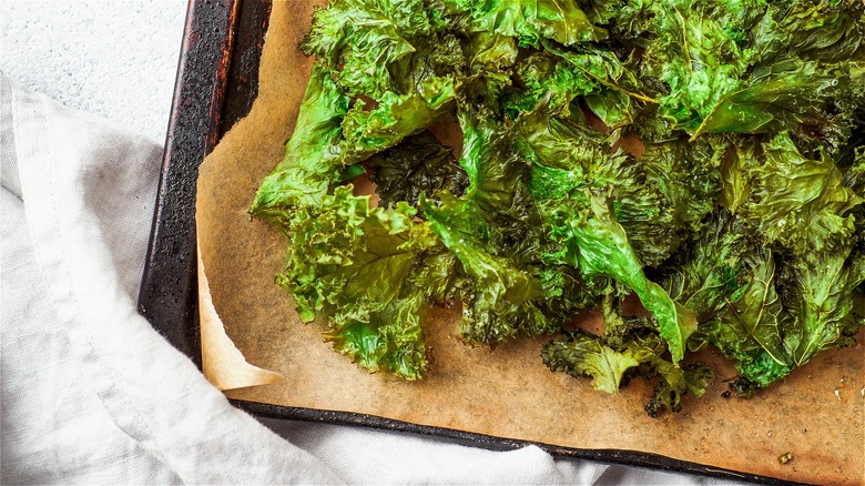 Kale chips on baking sheet 