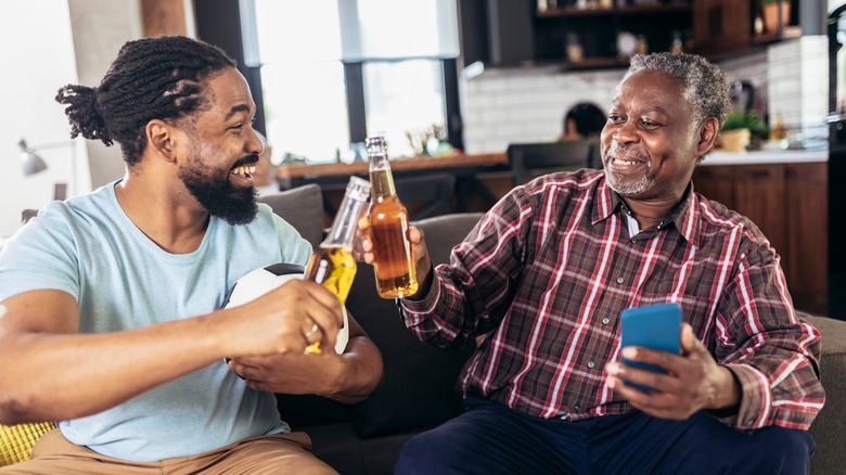 Guys enjoying a cold beer