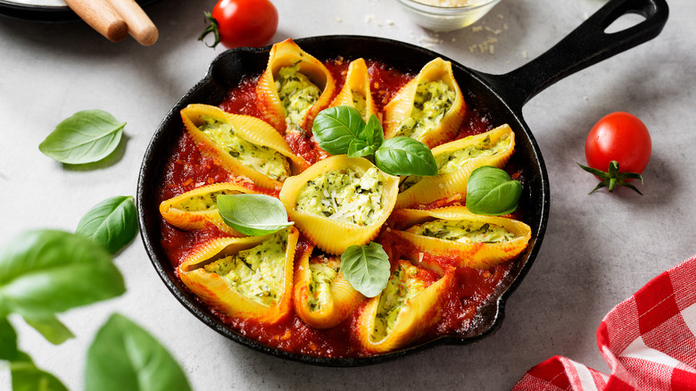 Spinach stuffed shells in pan