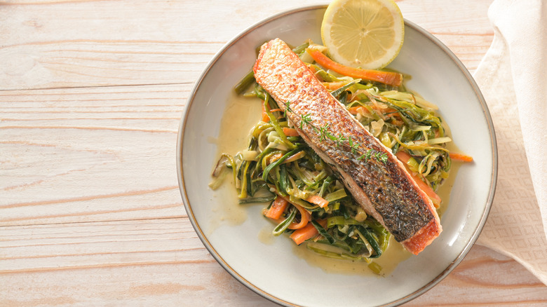 crispy salmon over slaw