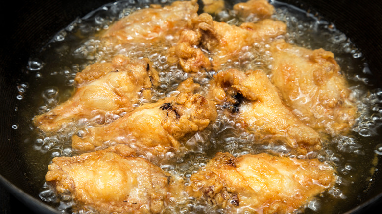chicken getting deep fried
