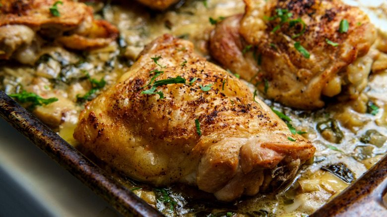 Baked chicken on baking tray