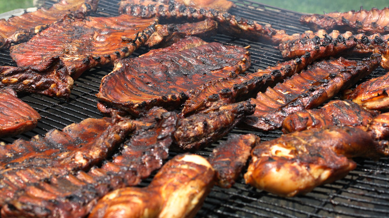 Ribs and chicken on an open air grill
