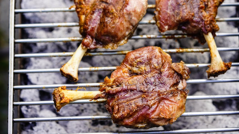 A pig knuckle on the grill
