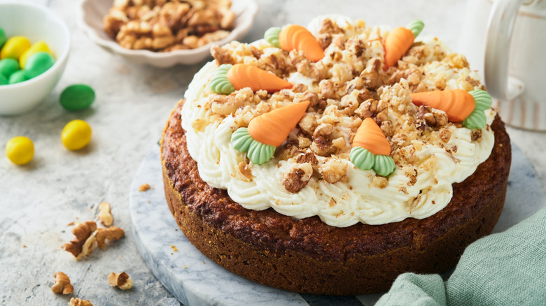 Carrot cake topped with walnuts