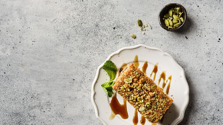Carrot cake topped with seeds