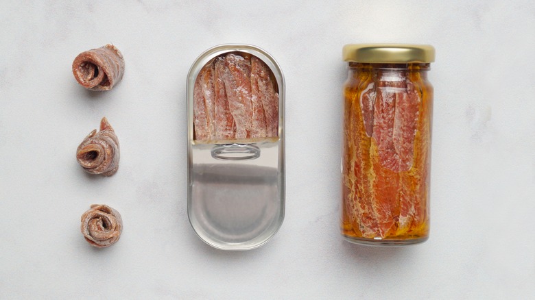 Anchovies in different receptacles