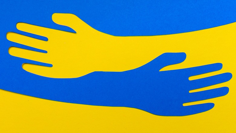 Ukranian flag hands