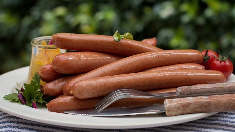bockwurst on a plate with herbs