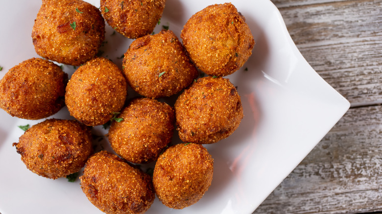 Hush puppies on white plate