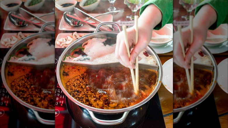 Adding ingredients to hotpot