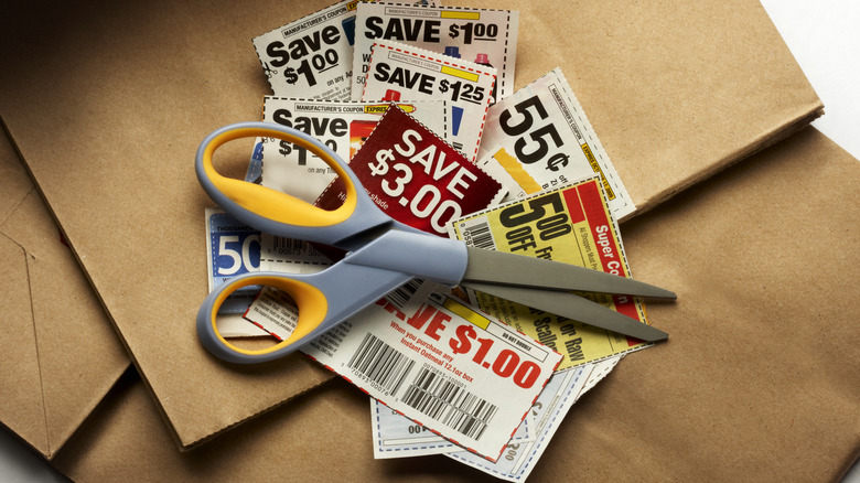 clipped coupons under scissors