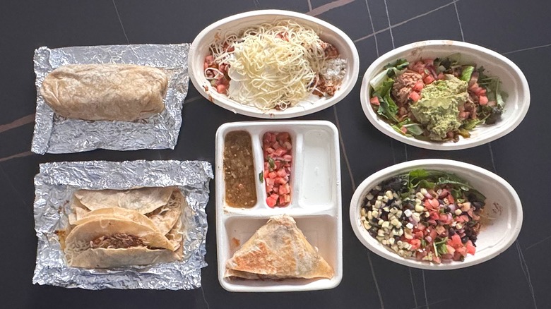 Table filled with different Chipotle items