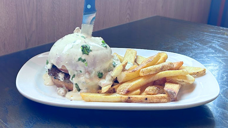 Red Robin's Lava Queso Burger and fries on a white plate