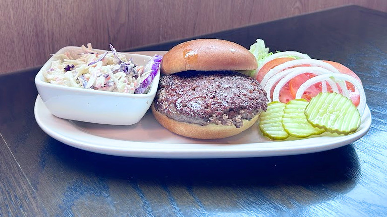 Red Robin's Keep It Simple Burger and coleslaw on a white platter