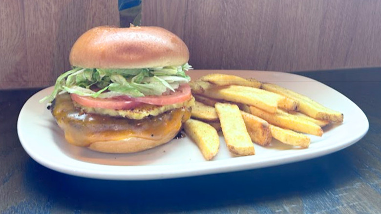 Red Robin's Banzai Burger and fries on a white plate