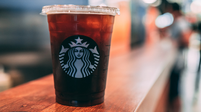 Starbucks iced coffee on bar