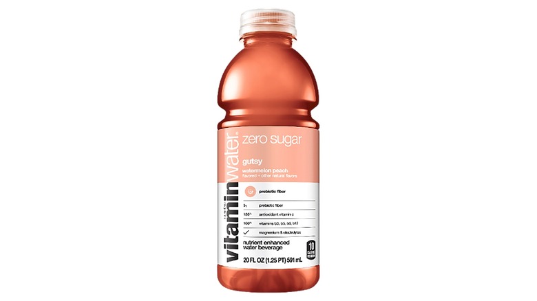 Six bottles of Vitaminwater Gutsy against a white background