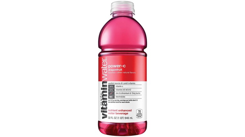 Four bottles of Vitaminwater Power-C against a white background