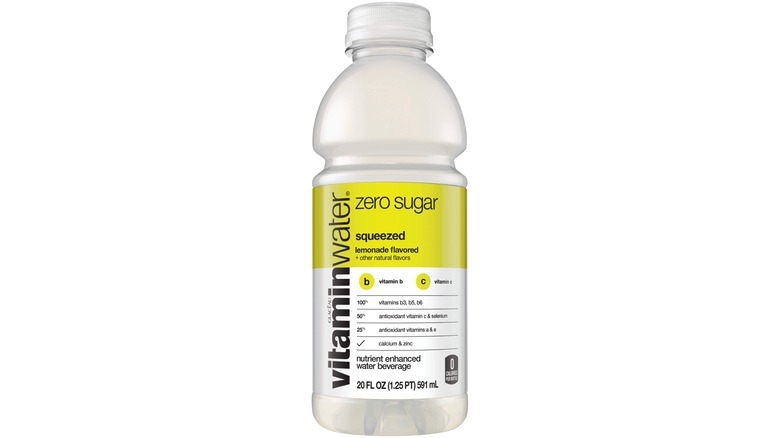 Six bottles of Vitaminwater Squeezed on a white background