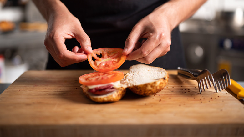 Preparing a tomato sandwich