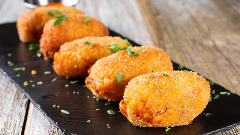Croquetas on a slate