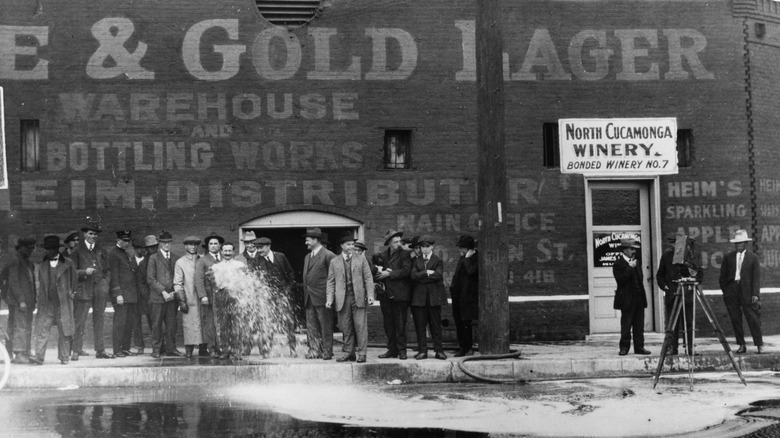 wine being flushed into gutter