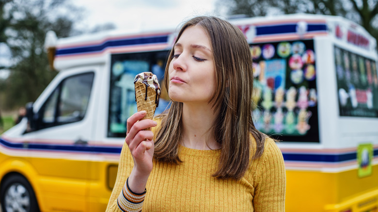 eating ice cream near truck