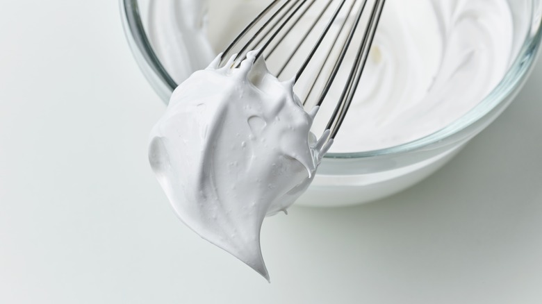 Whipped cream on whisk