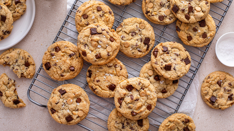 freshly baked chocolate chip cookies on a cooling rack
