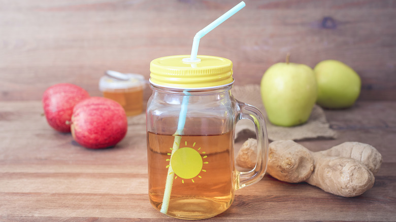 Apple vinegar ginger surrounding switchel