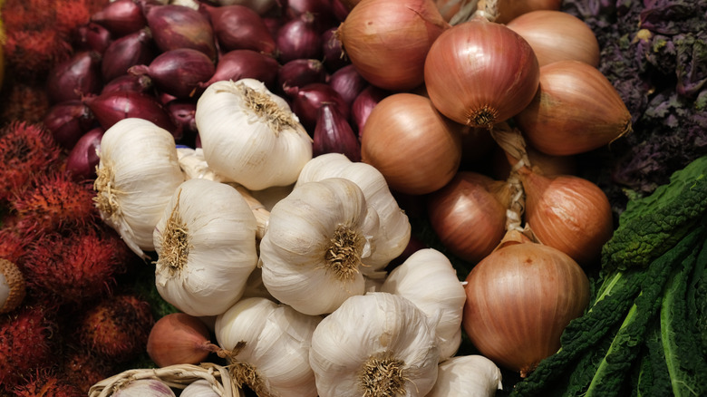 Shallots, garlic bulbs, yellow onions