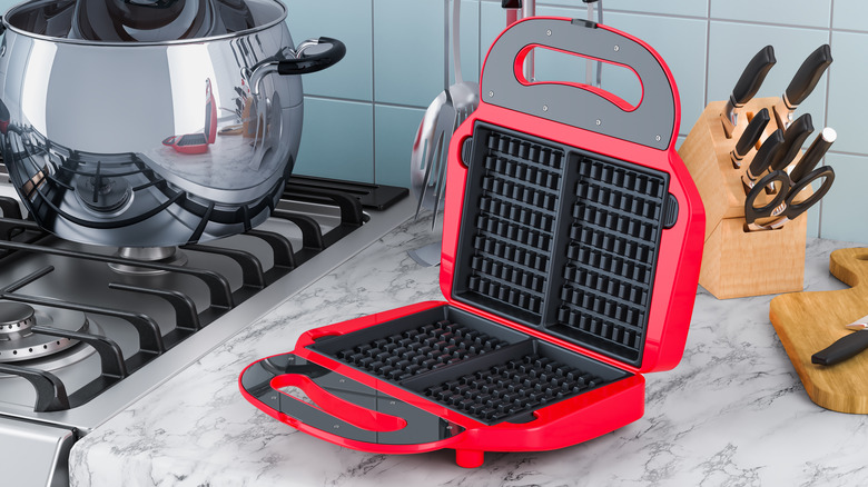 Waffle iron on kitchen counter