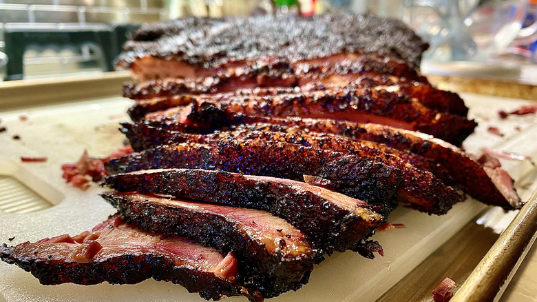 Texas brisket sliced on a cutting board
