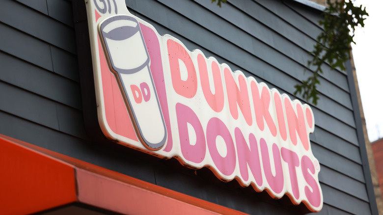 An old Dunkin' Donuts storefront sign