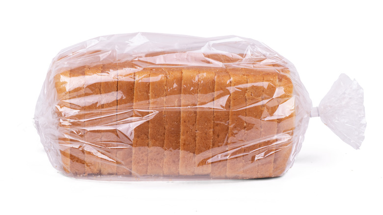 Loaf of sliced bread in plastic packaging