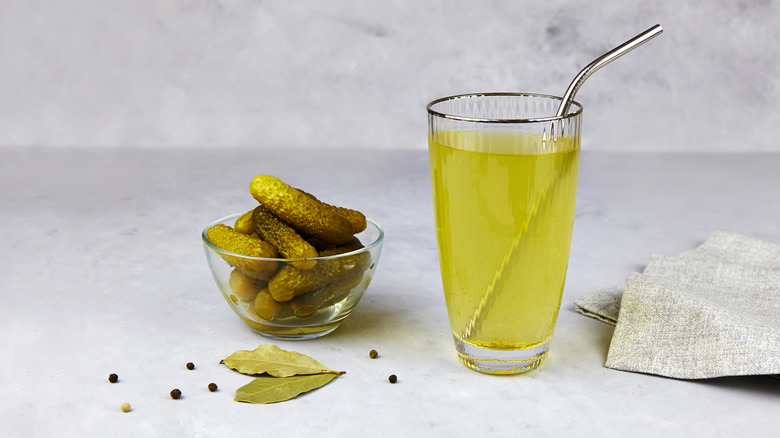 A glass of pickle juice