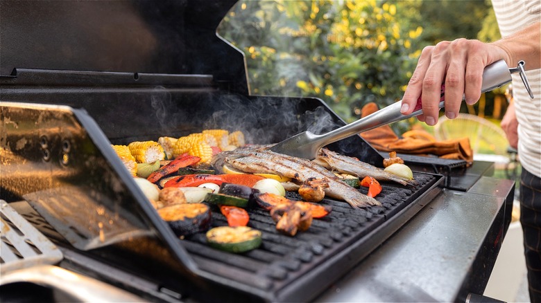 Fish and vegetables on grill 