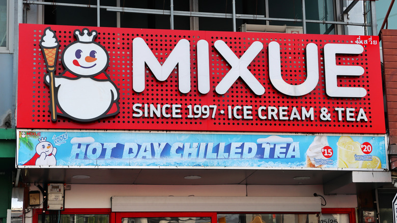 Mixue Ice Cream and Tea store sign with snowman logo in Thailand