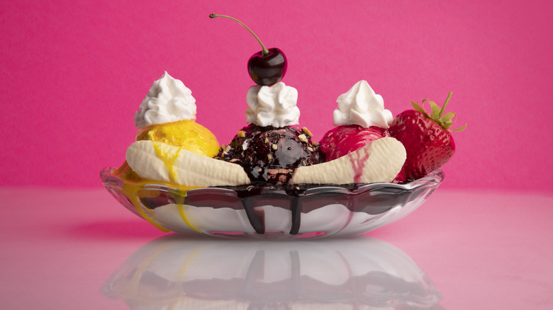 Banana split on pink background