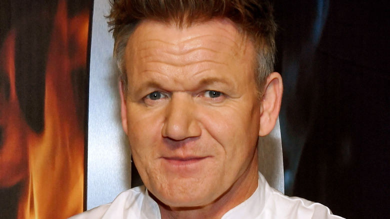 Gordon Ramsay smiling in blue shirt 