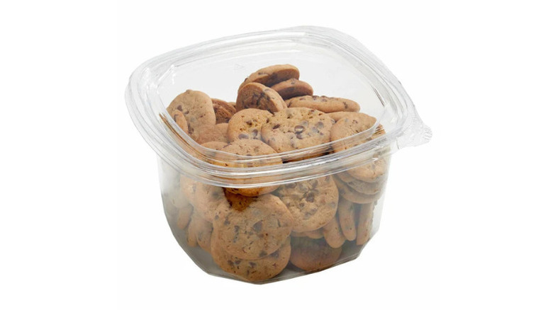 a plastic container of mini chocolate chip cookies