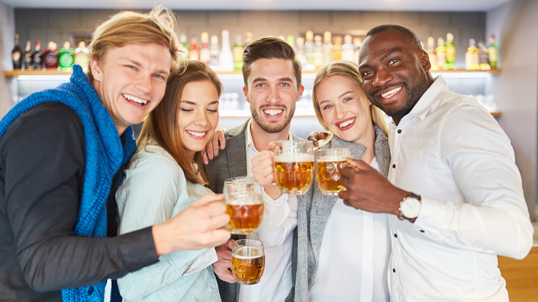 Friends drinking at a bar