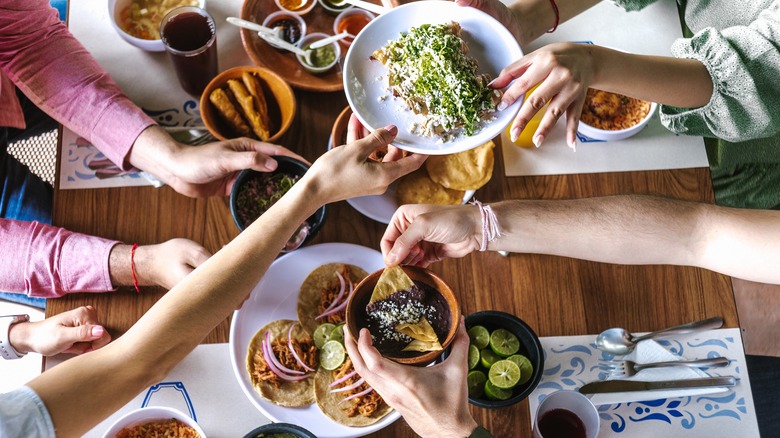 People eating at Mexican restaurant